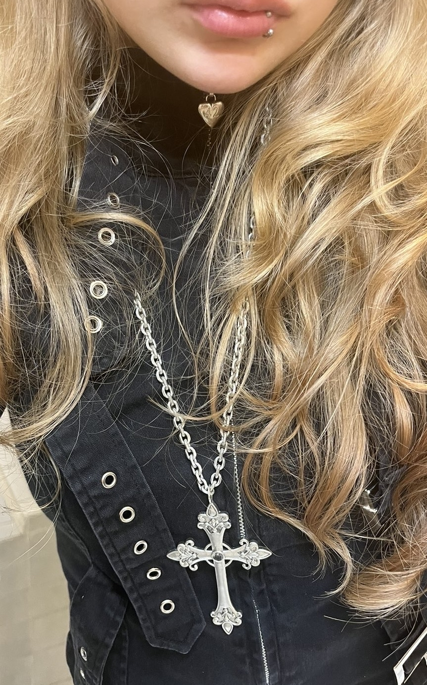 Sofiia, pictured in alternative clothing, wearing a cross. Pihla Saxell