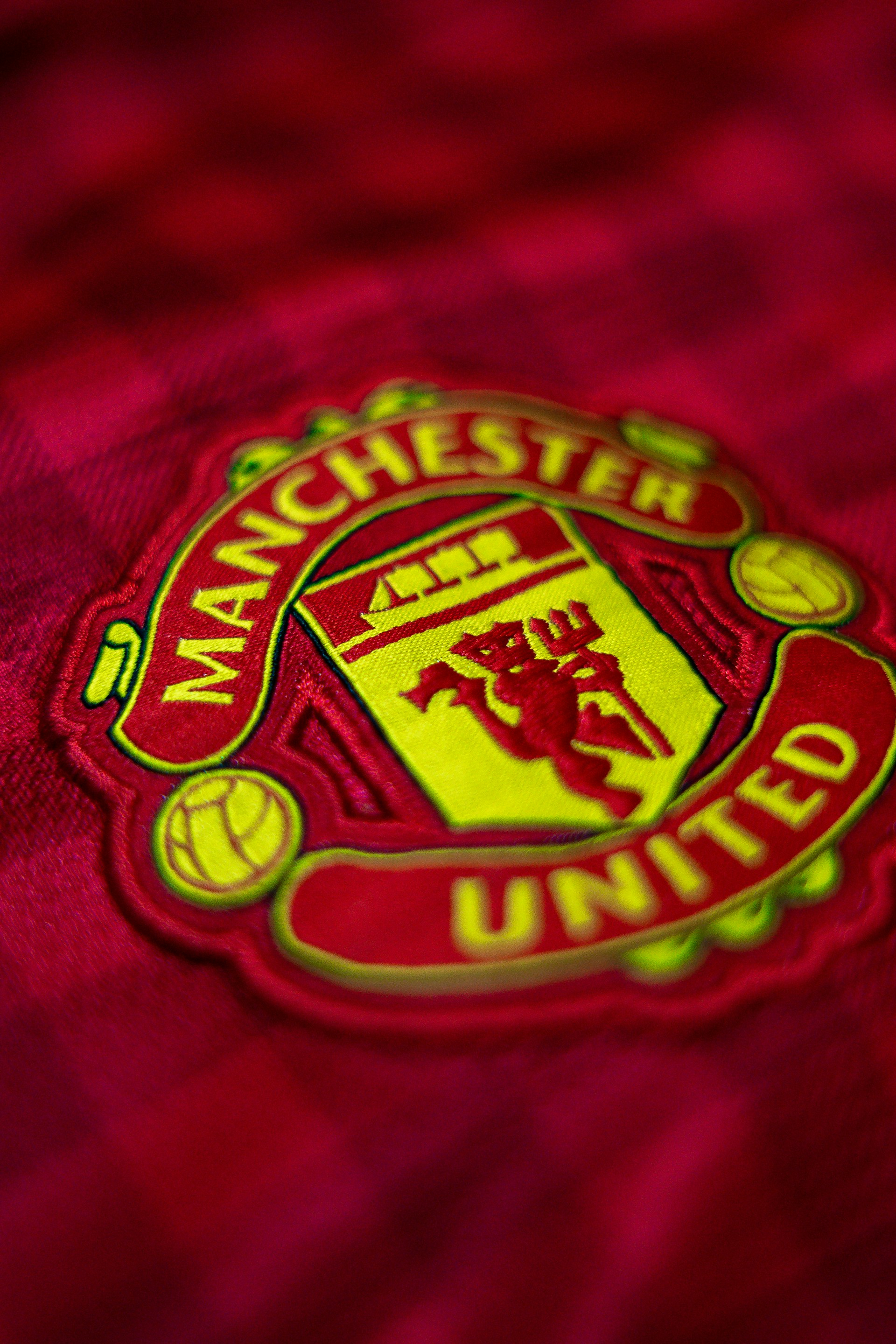 manchester uniteds logga Dexter Fernanandes