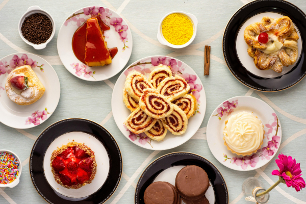 Photo by Julio Melanda from Pexels: https://www.pexels.com/photo/variety-of-baked-and-dessert-foods-on-plates-1448721/